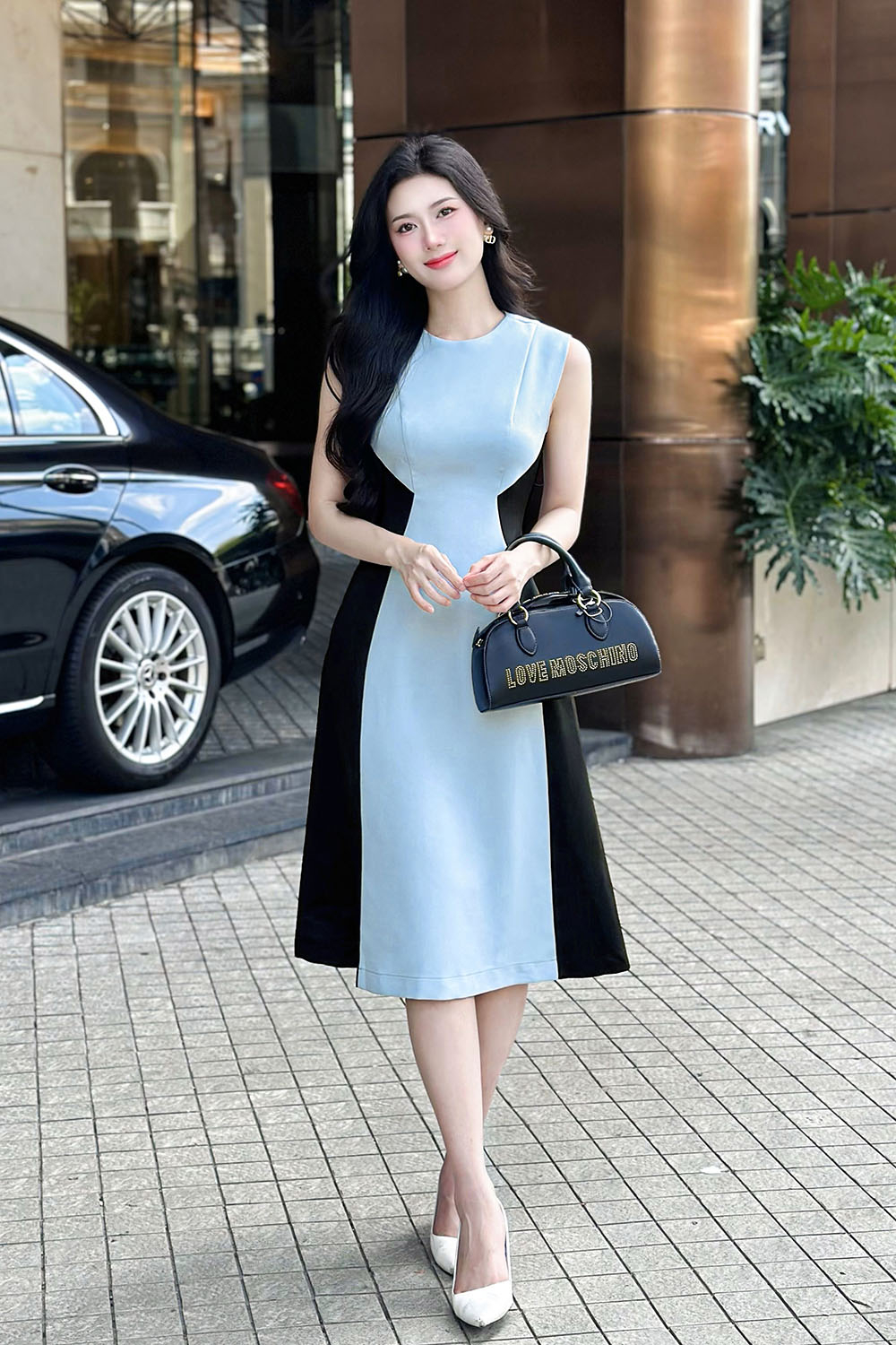 Đầm chữ A sát nách phối màu xanh đen