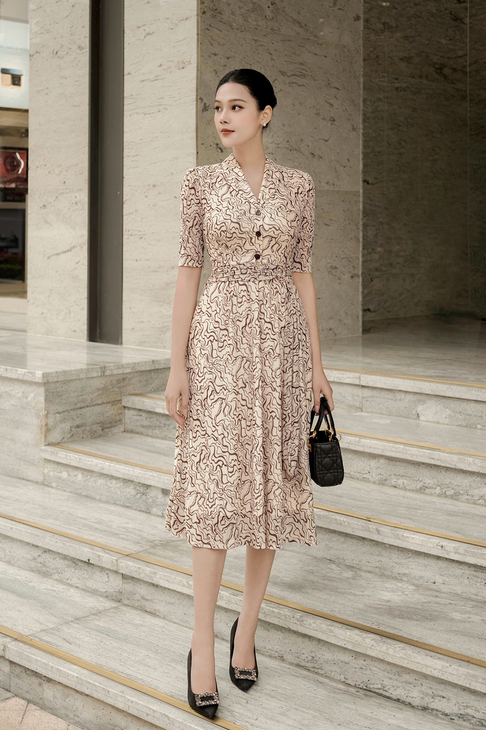 Đầm công sở dáng xòe họa tiết eo xếp ly