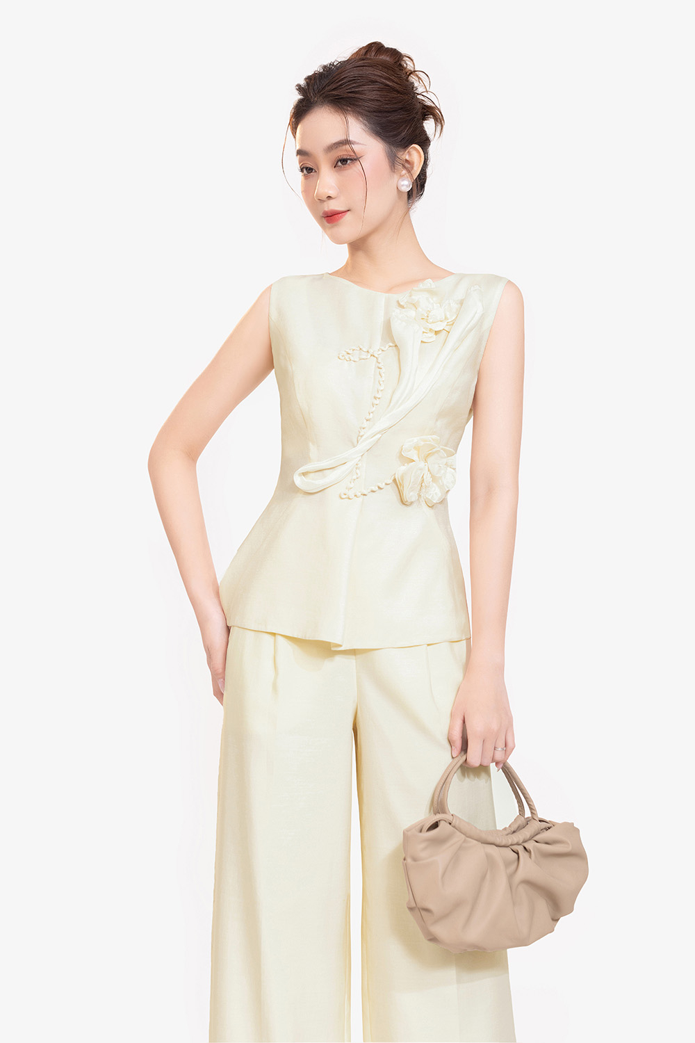 Áo kiểu peplum đính hoa sát nách