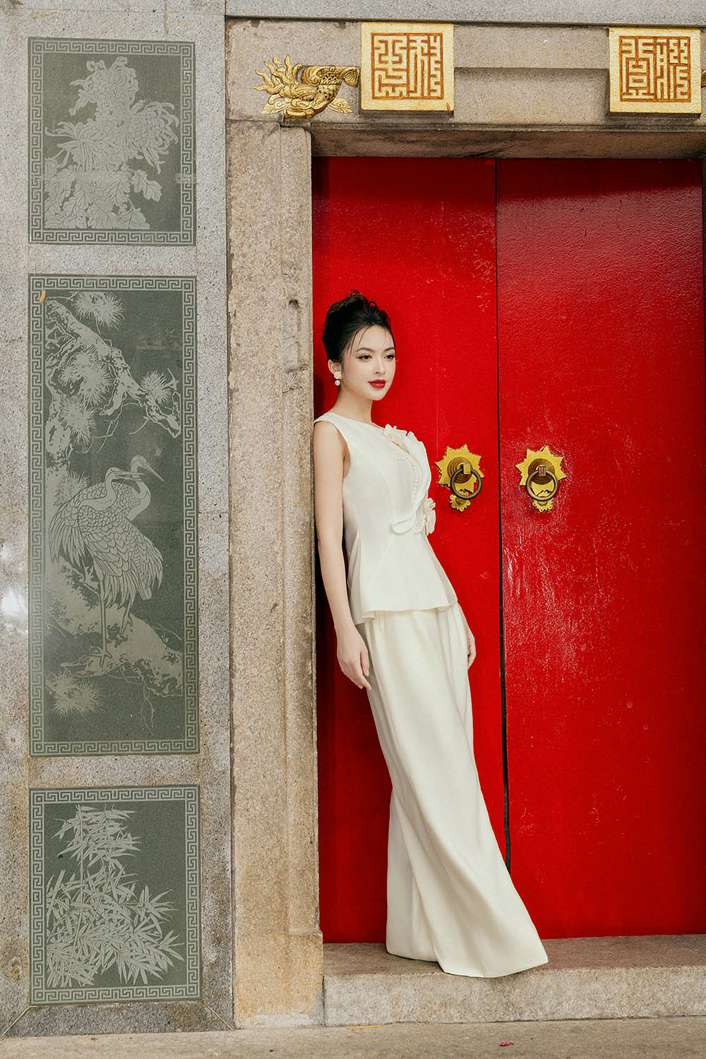 Áo kiểu peplum đính hoa sát nách