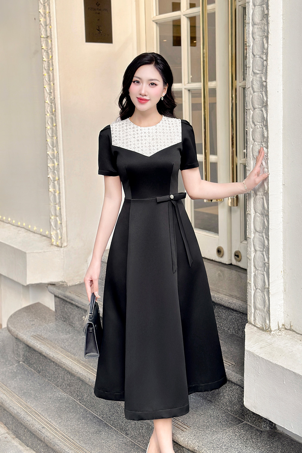 Đầm đen dự tiệc dáng xòe đính kim sa