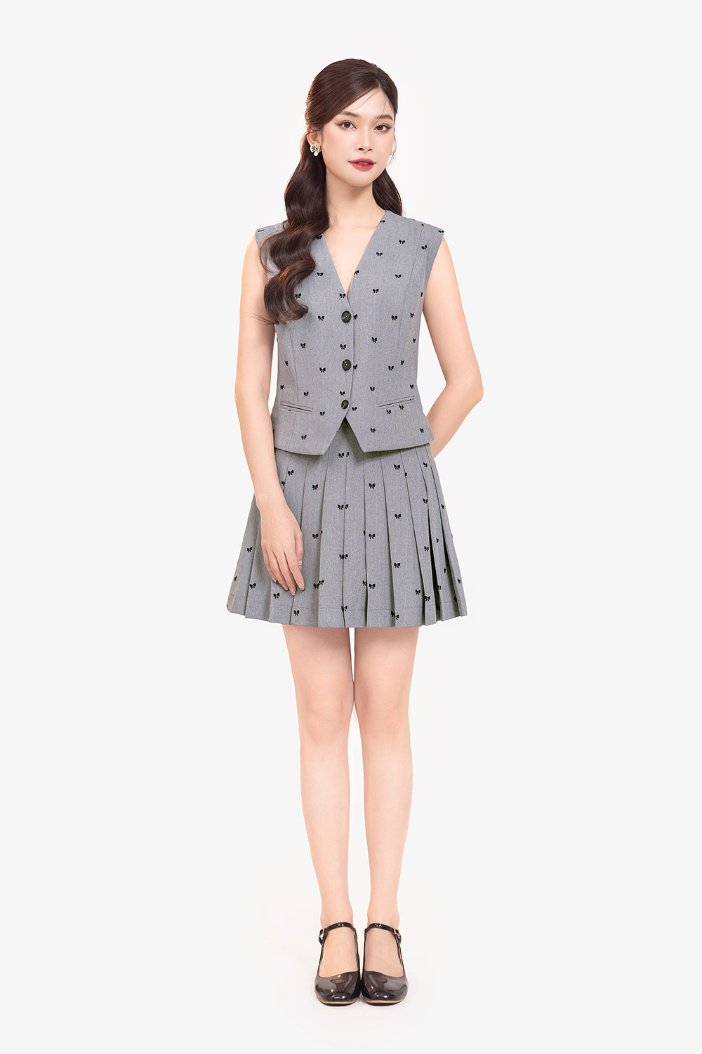 Áo gile nữ màu xám họa tiết nơ