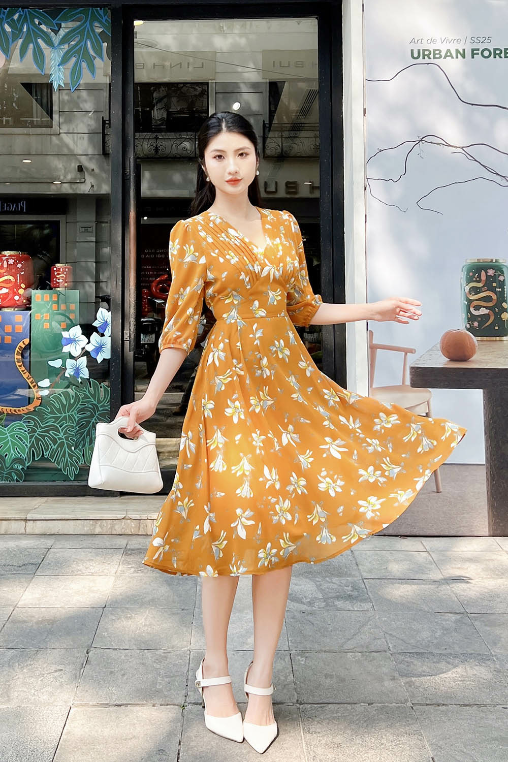 Đầm hoa vàng tay lửng dáng xòe