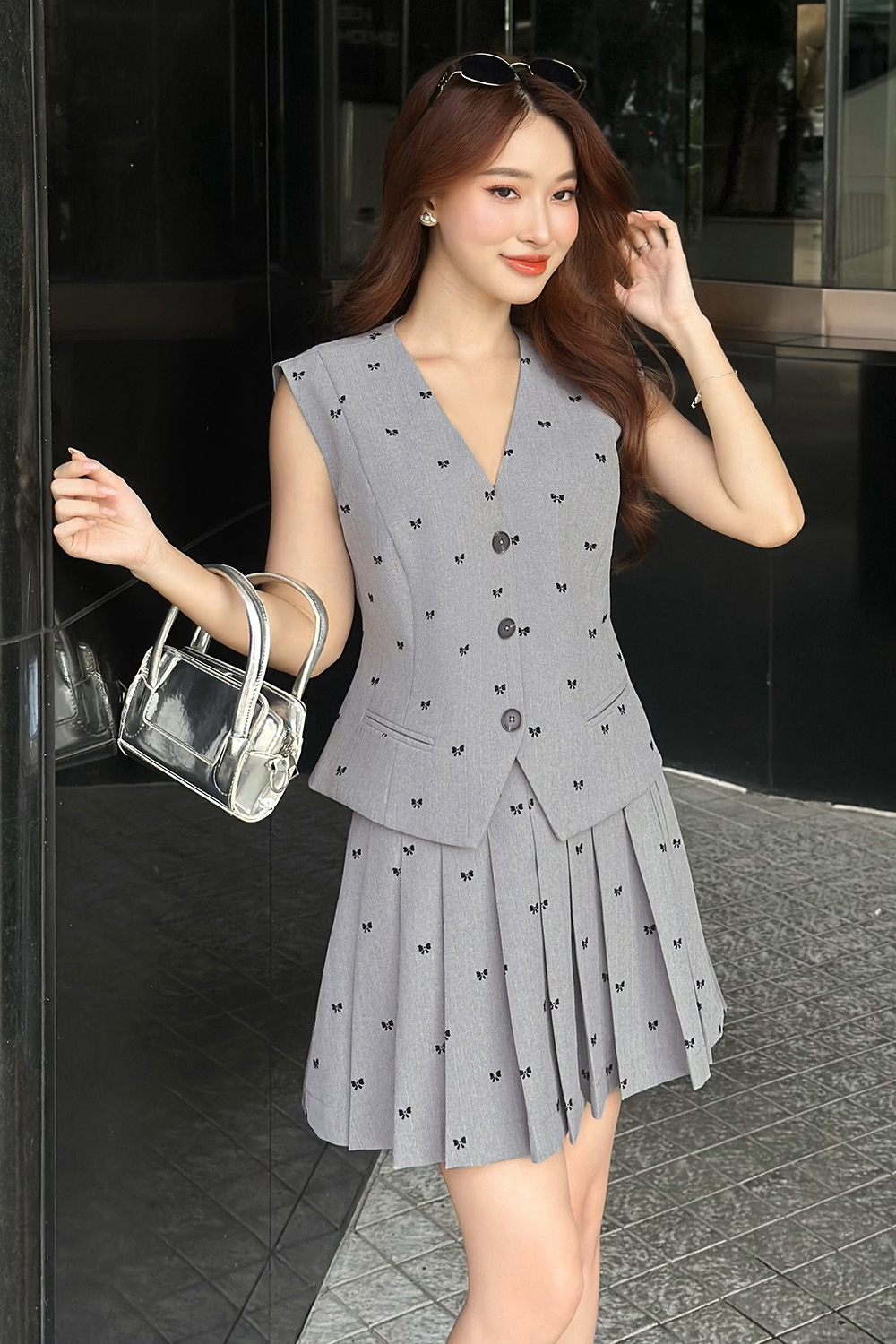 Áo gile nữ màu xám họa tiết nơ