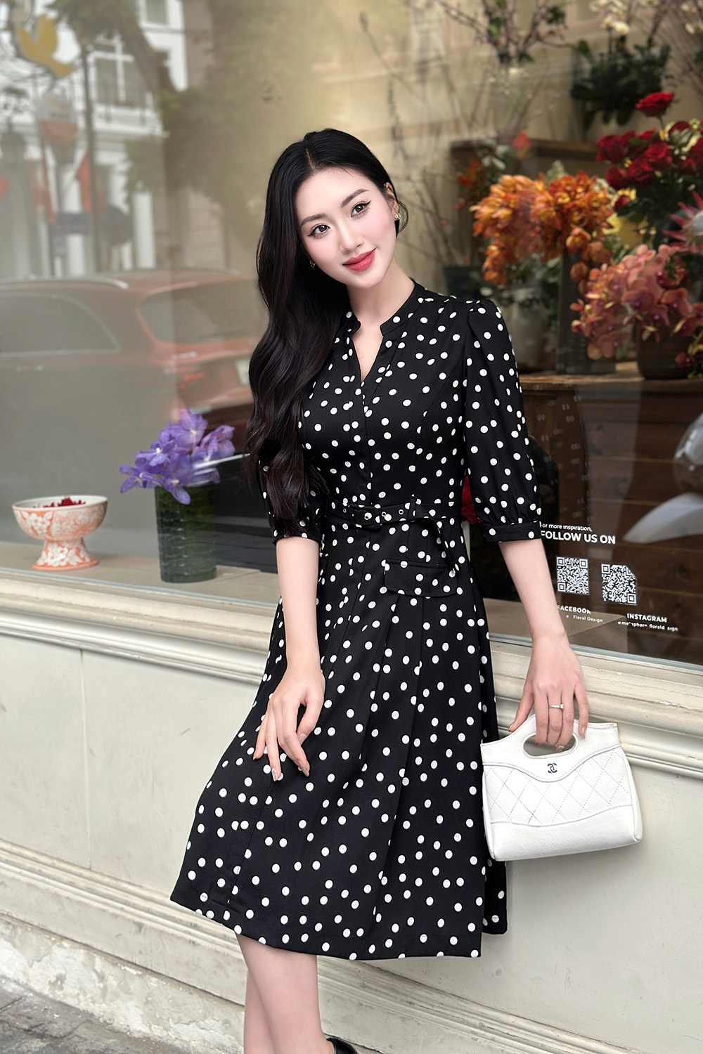 Đầm đen chấm bi trắng dáng xòe xếp ly