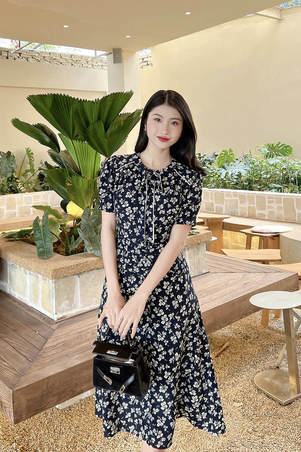 Đầm hoa dáng xòe nhấn eo cổ phối nơ