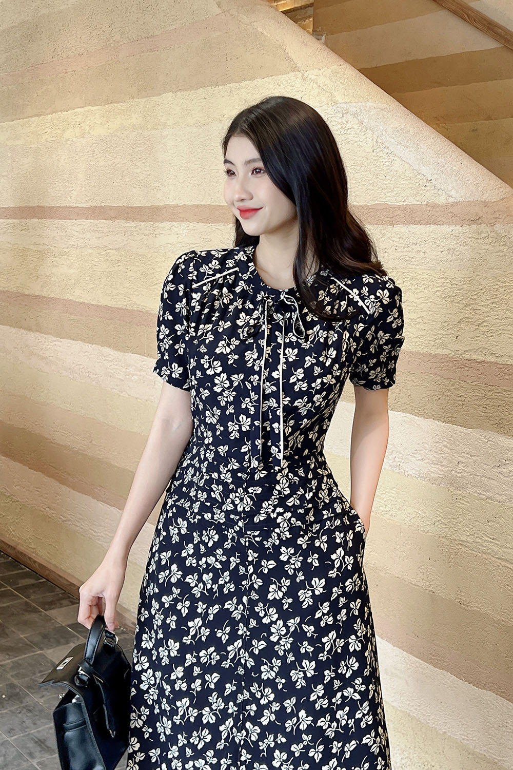 Đầm hoa dáng xòe nhấn eo cổ phối nơ