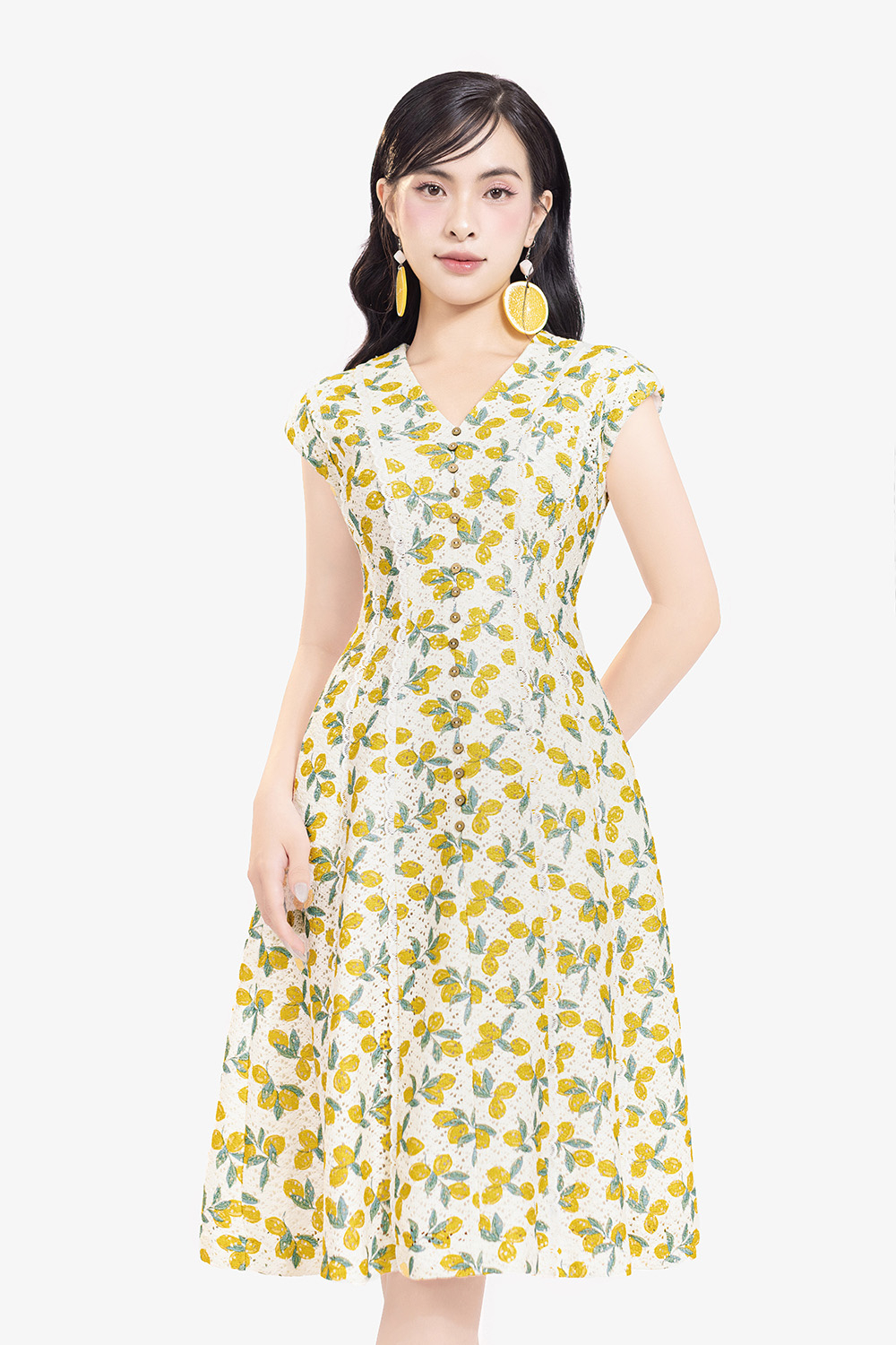 Đầm xòe chữ A màu trắng họa tiết vàng