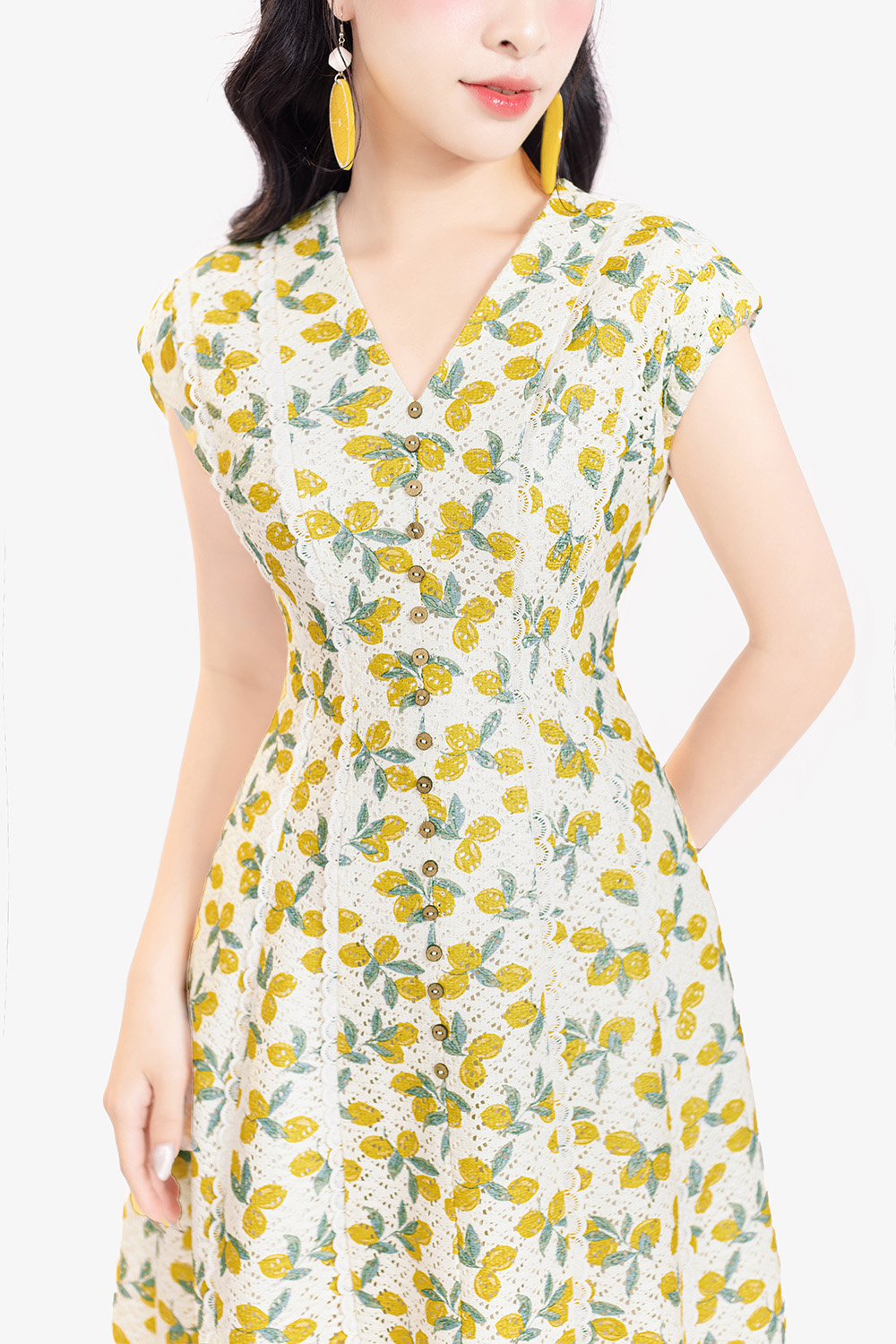 Đầm xòe chữ A màu trắng họa tiết vàng