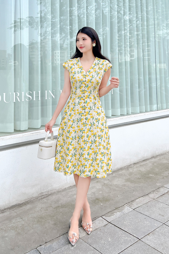 Đầm xòe chữ A màu trắng họa tiết vàng HL30-28