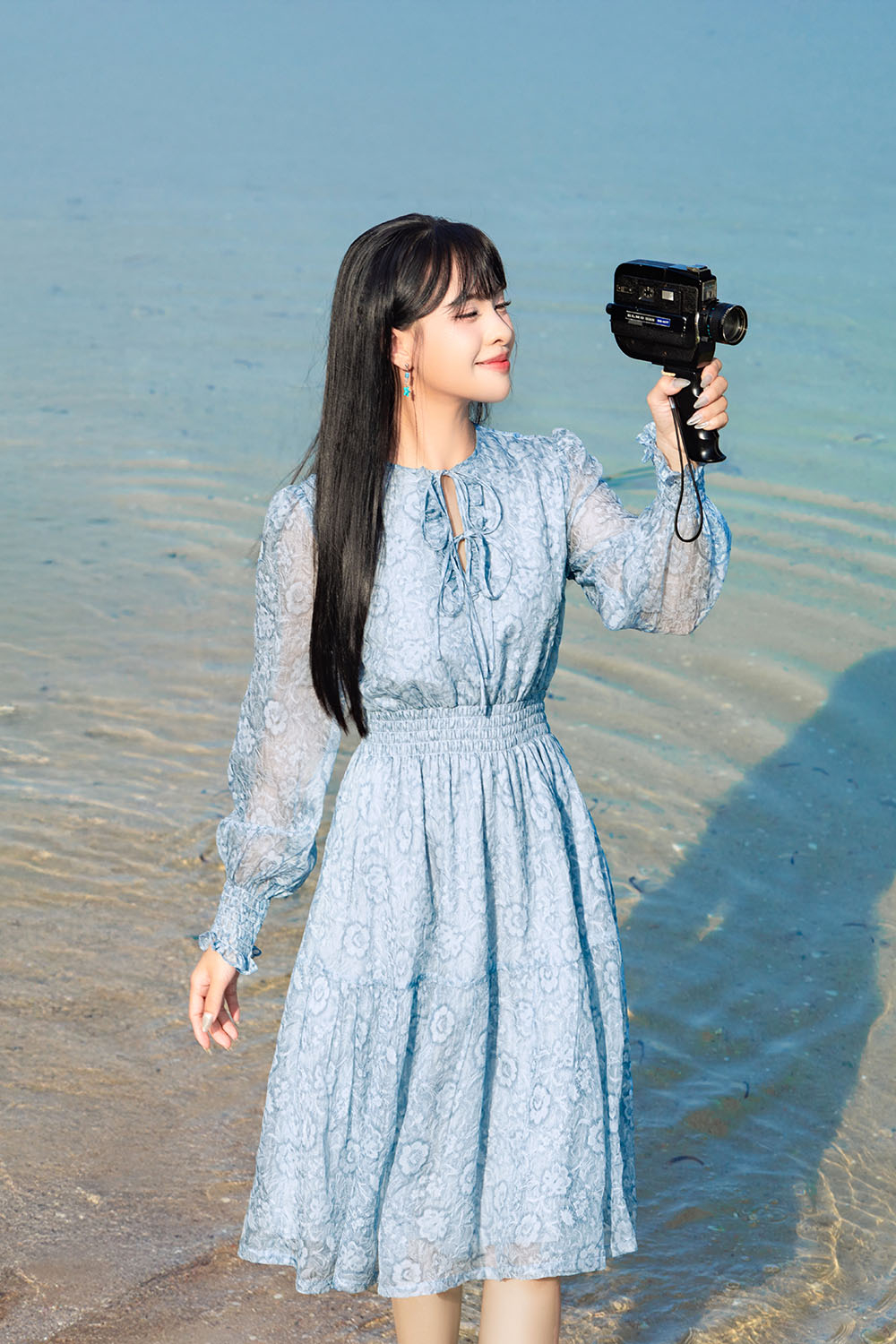 Đầm xòe tay dài họa tiết hoa