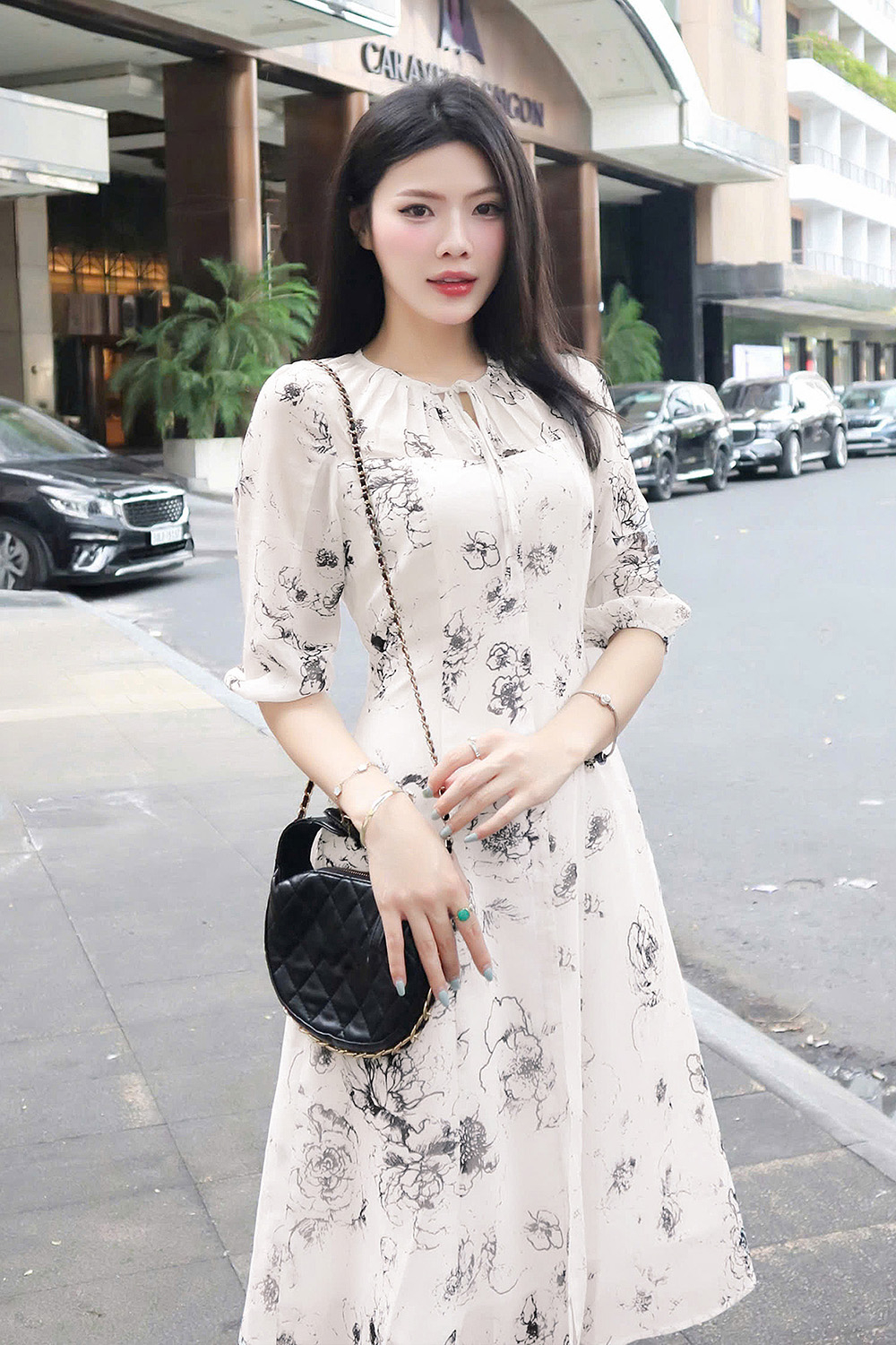 Đầm voan trắng dáng A xòe cổ phối nơ