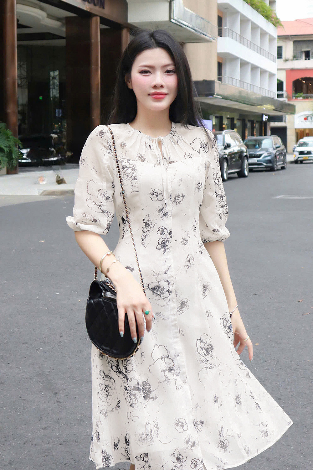 Đầm voan trắng dáng A xòe cổ phối nơ