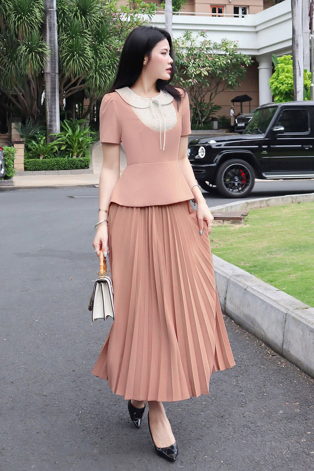 Chân váy xòe dài xếp ly màu hồng