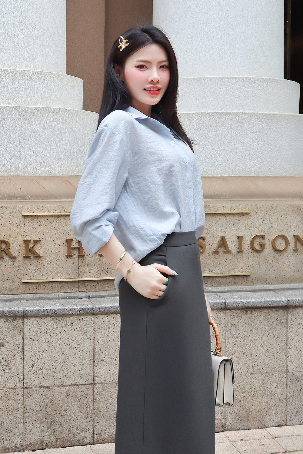 Áo sơ mi nữ màu xanh phối viền trắng