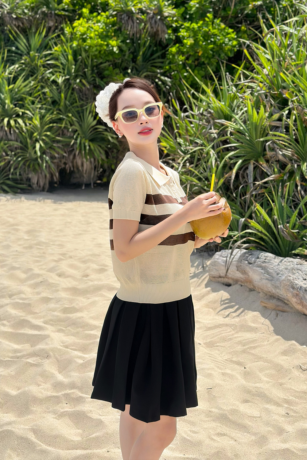 Chân váy xếp ly đen dáng ngắn