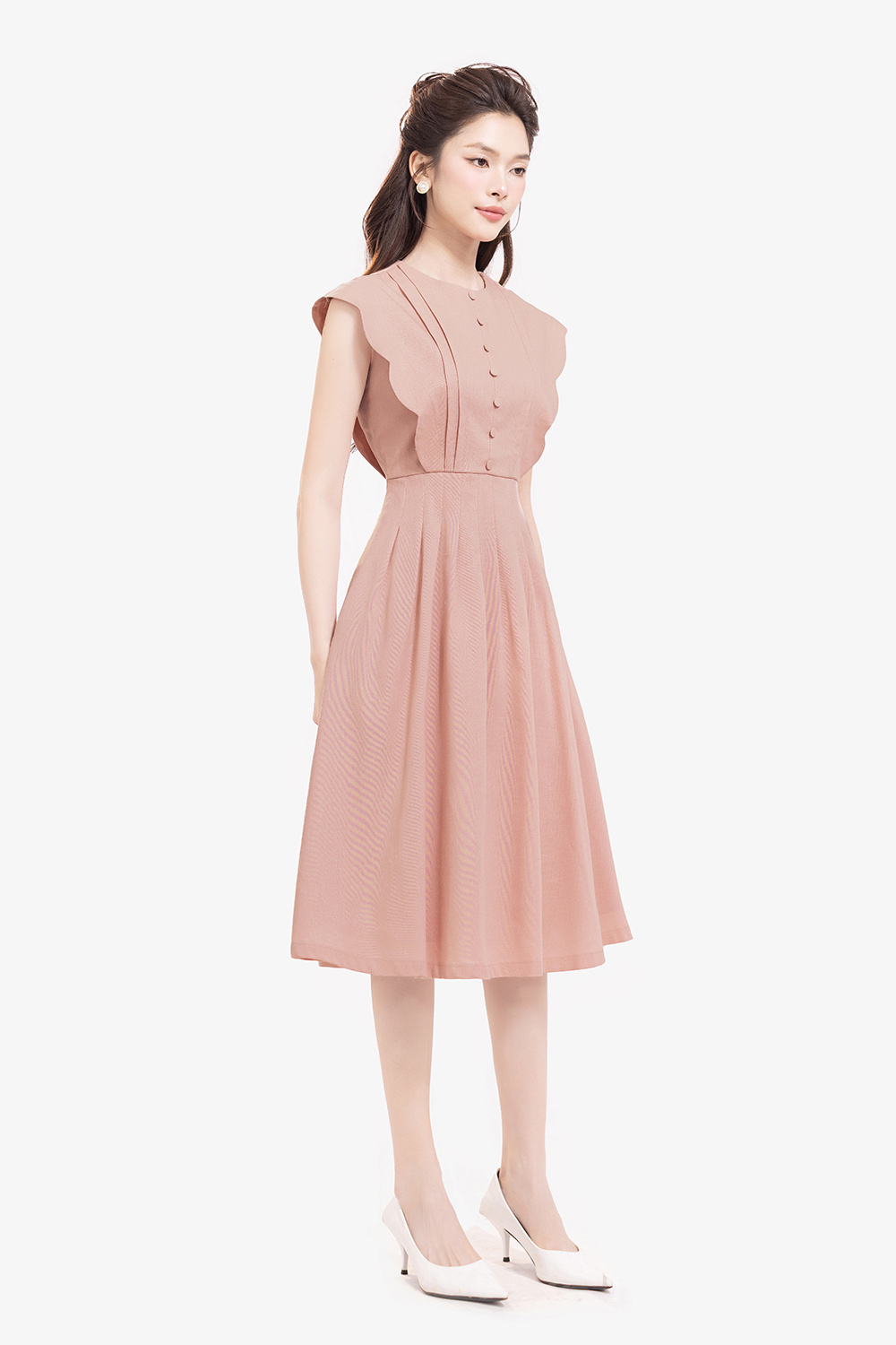 Đầm xòe hồng tay hến phối nút