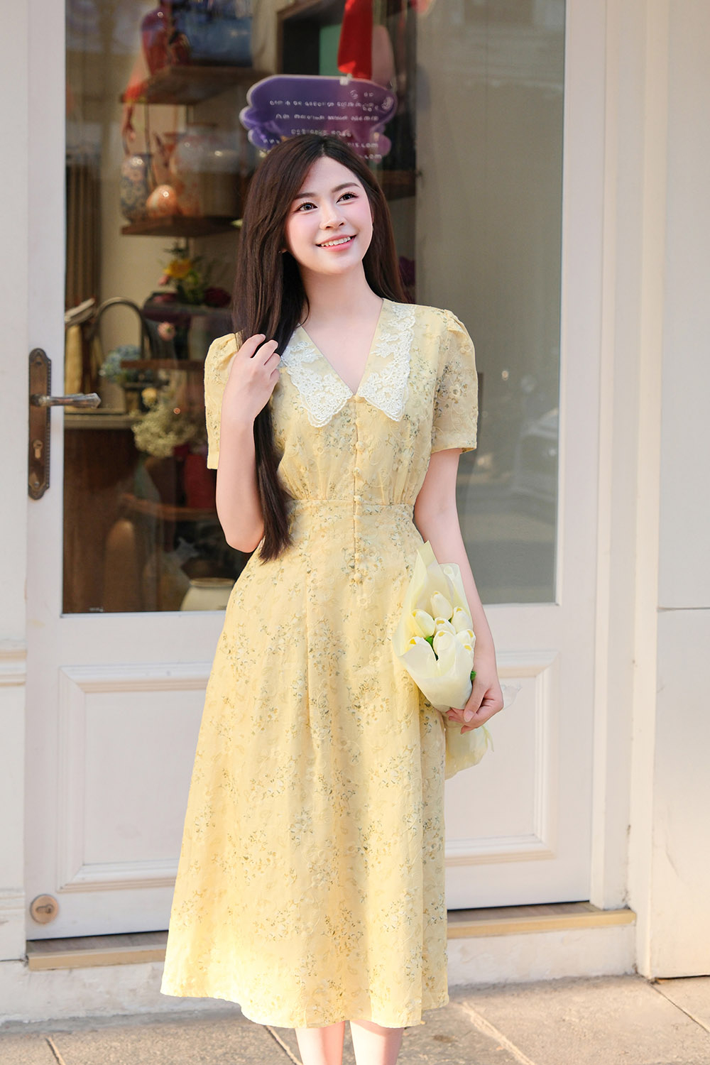 Đầm vàng hoa nhí dáng chữ A xòe cổ sen