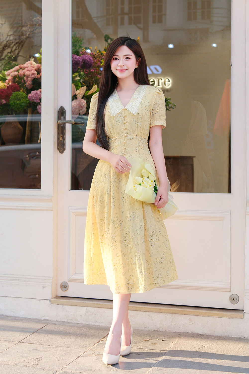 Đầm vàng hoa nhí dáng chữ A xòe cổ sen