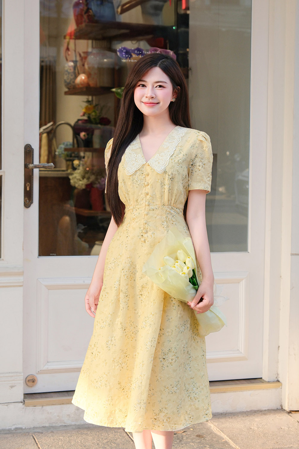 Đầm vàng hoa nhí dáng chữ A xòe cổ sen