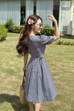 Đầm caro dáng xòe kèm thắt lưng