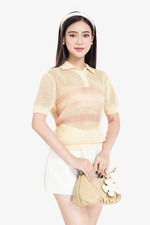 Áo polo kem sọc hồng