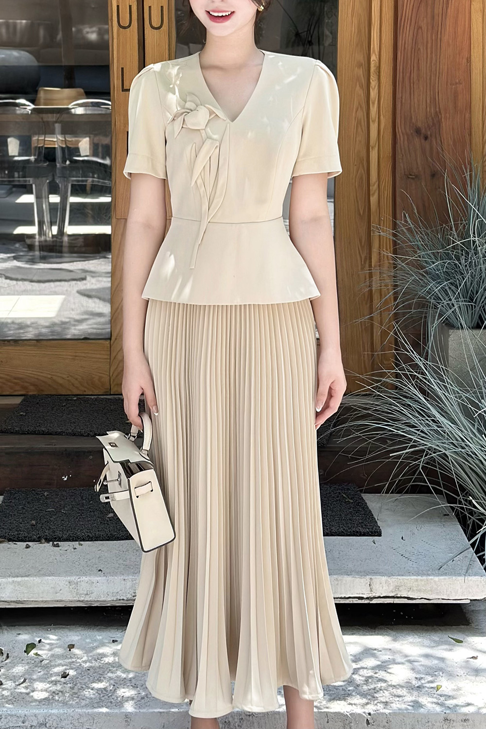 Chân váy công sở dáng xòe xếp ly