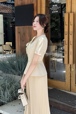 Chân váy công sở dáng xòe xếp ly