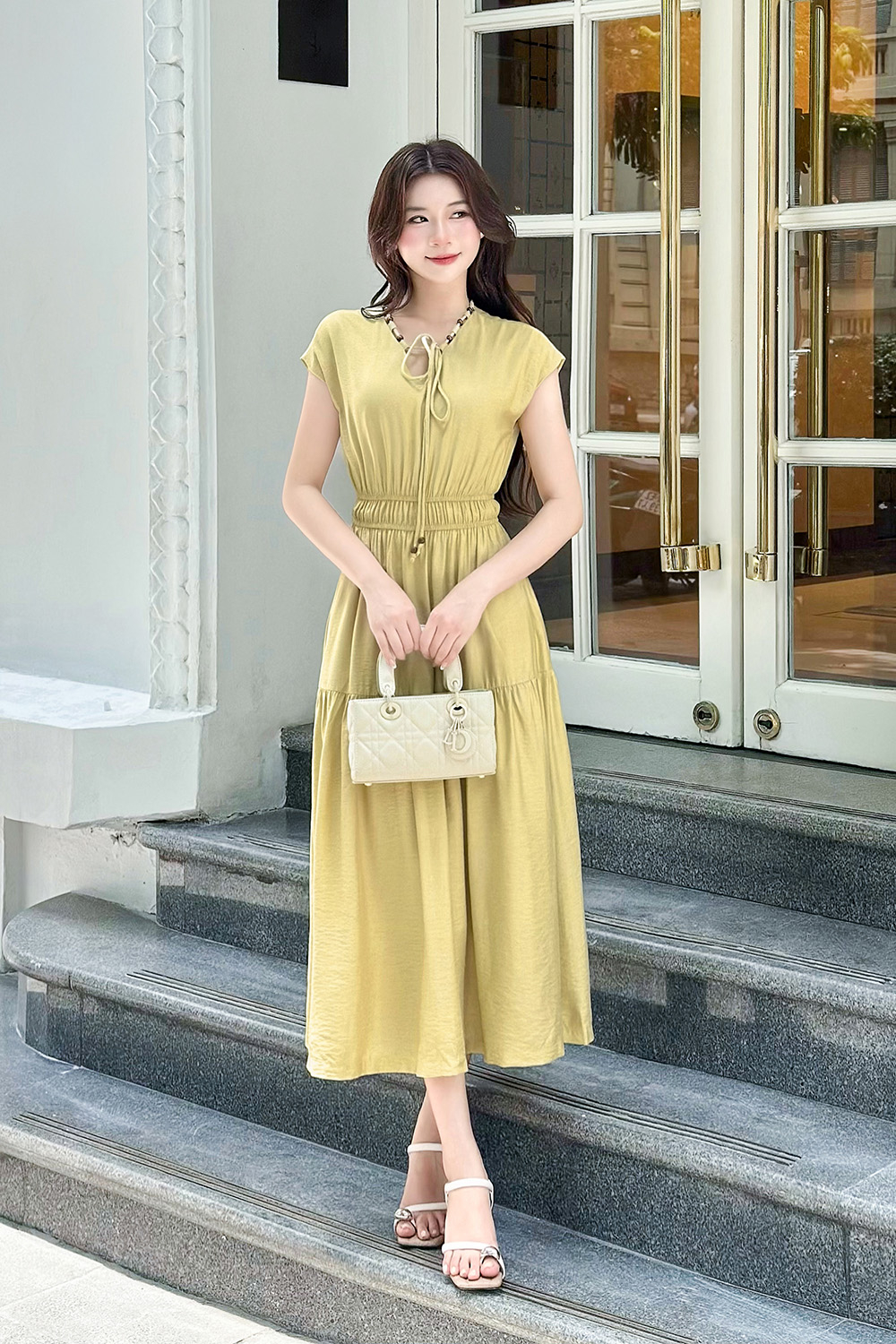 Đầm xòe dáng dài tay hến phối hạt gỗ