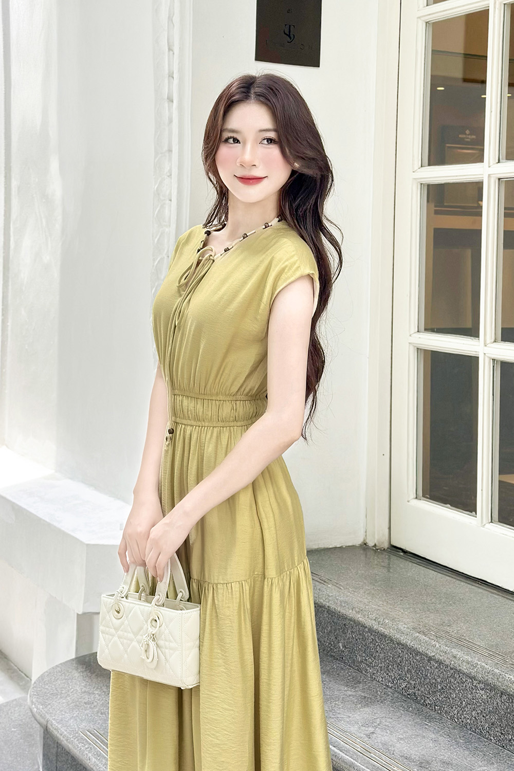 Đầm xòe dáng dài tay hến phối hạt gỗ