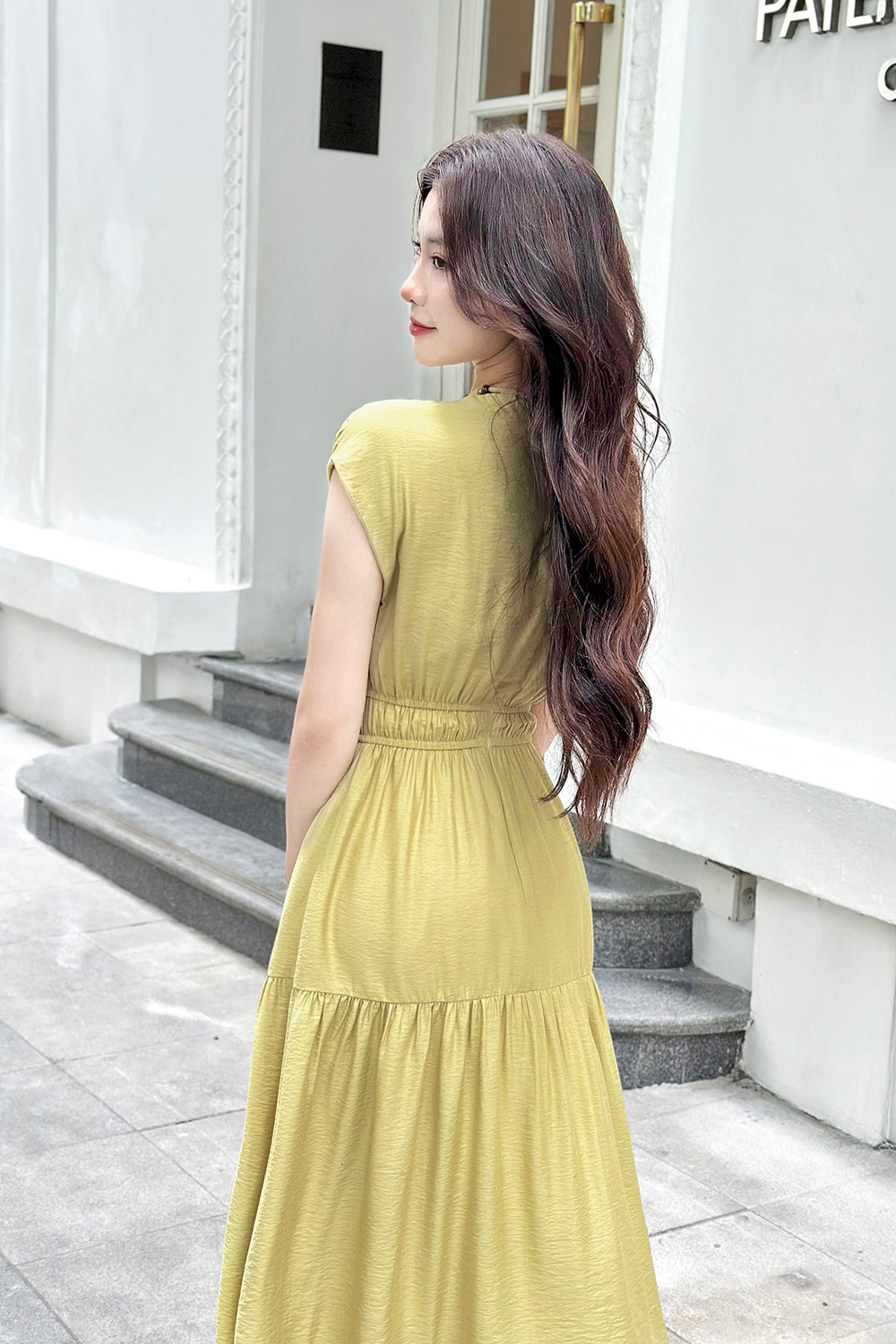 Đầm xòe dáng dài tay hến phối hạt gỗ