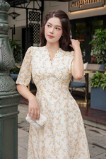 Đầm trắng hoa nhí màu cam dáng xòe