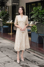 Đầm trắng hoa nhí màu cam dáng xòe