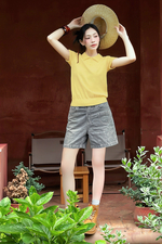 Áo polo len dệt kim màu vàng