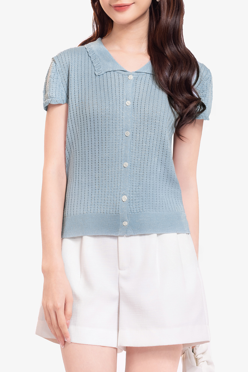 Áo len dệt kim màu xanh phối nút