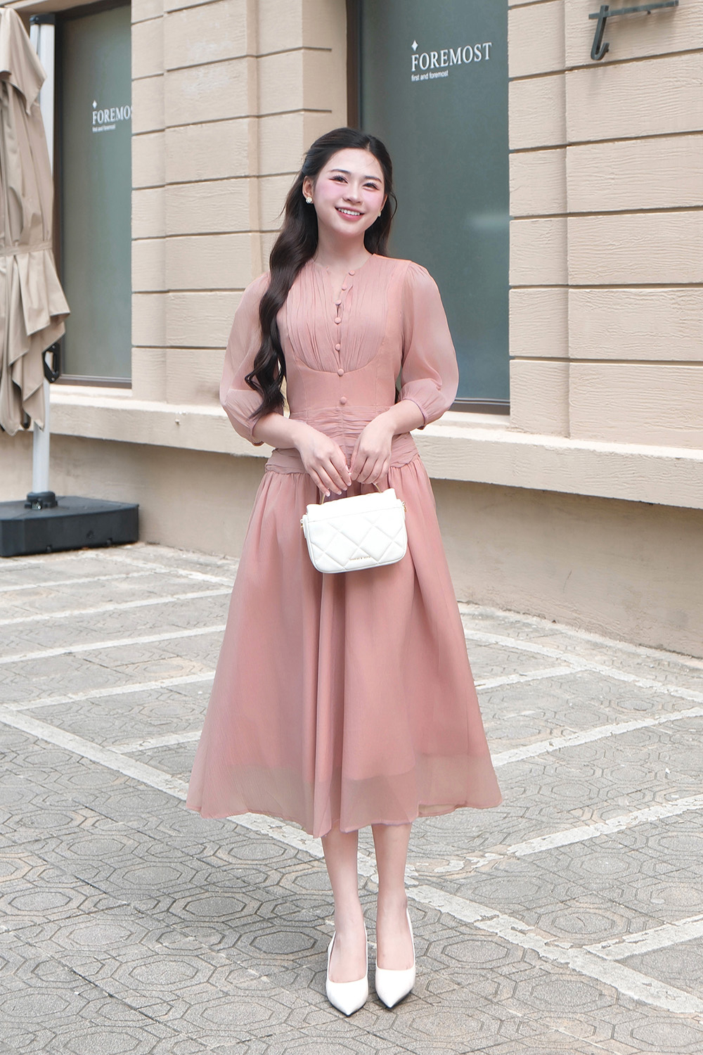 Đầm xòe hồng nhấn eo tay lỡ