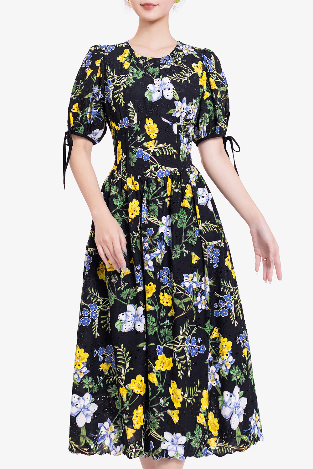 Đầm đen hoa dáng xòe tay phồng phối nơ