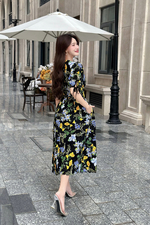 Đầm đen hoa dáng xòe tay phồng phối nơ