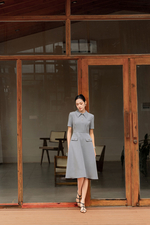 Đầm xòe công sở cổ sen phối nút