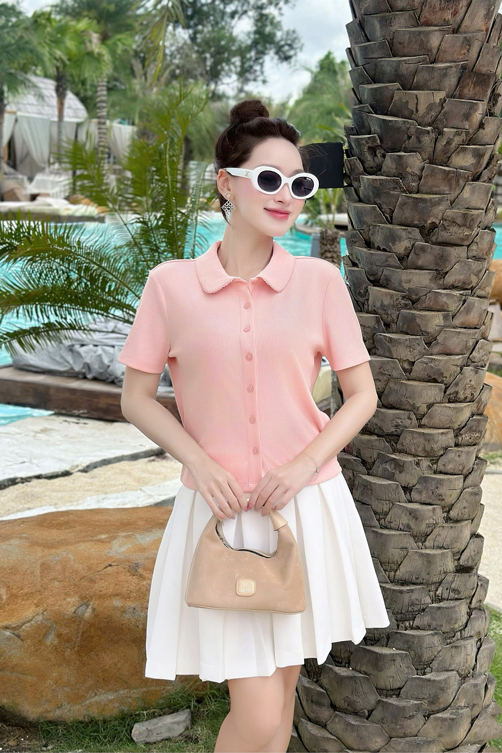 Áo thun gân màu hồng cổ sen cài cúc trước