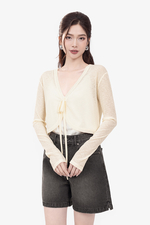 Áo khoác cardigan màu kem buộc dây eo