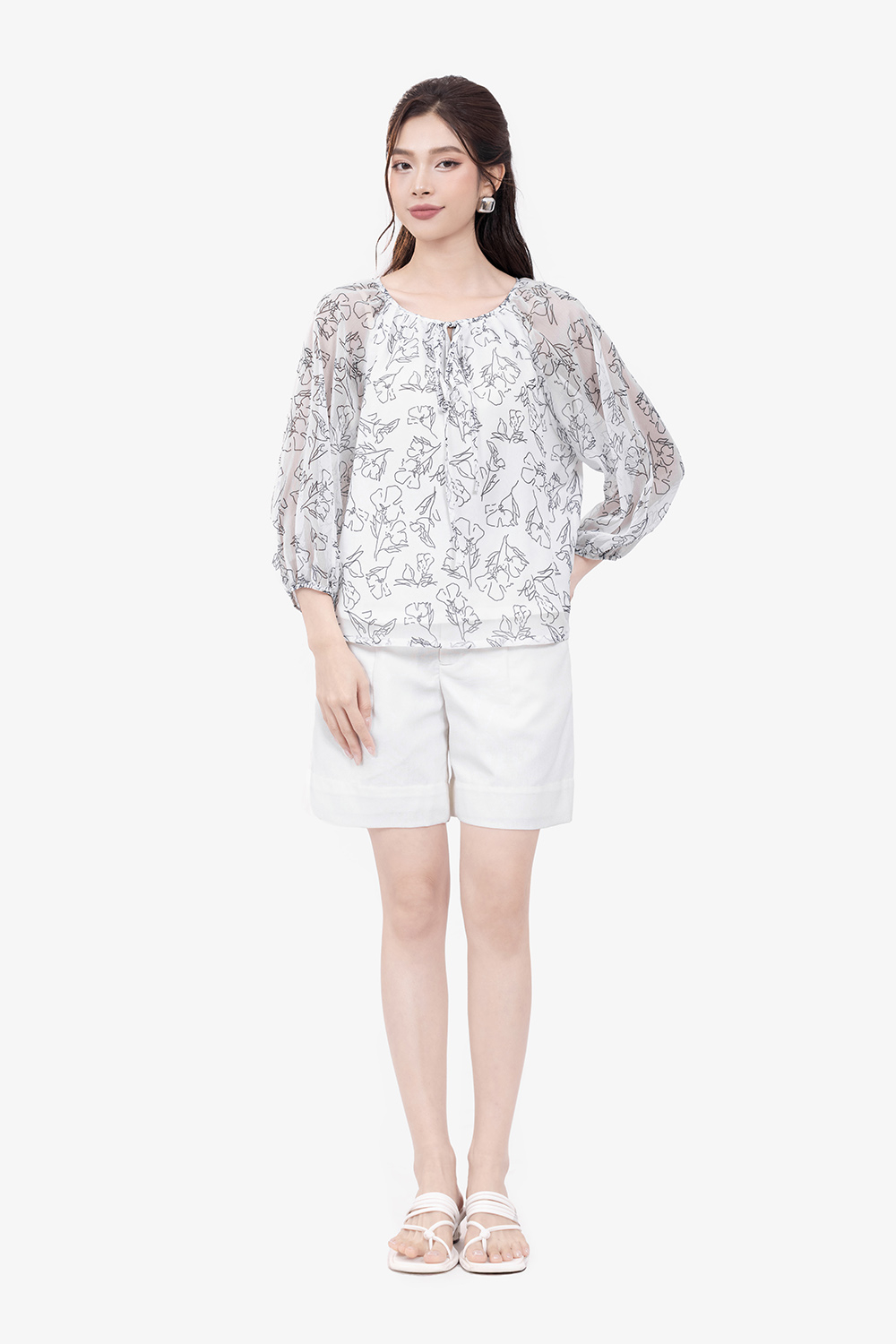 Áo kiểu nữ màu trắng họa tiết đen