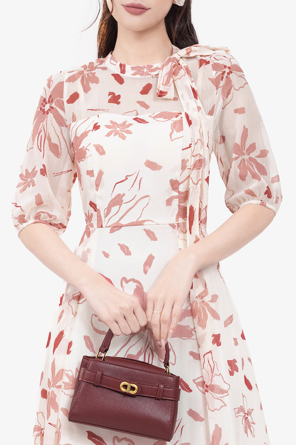 Đầm hoa dáng xòe tay phồng cổ phối nơ