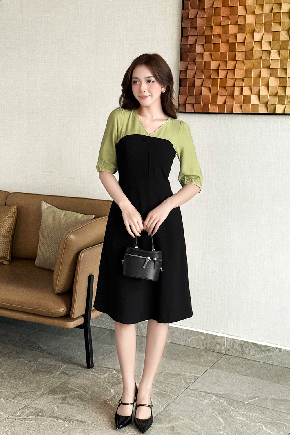 Đầm đen thun tuyết dáng chữ A tay phối màu