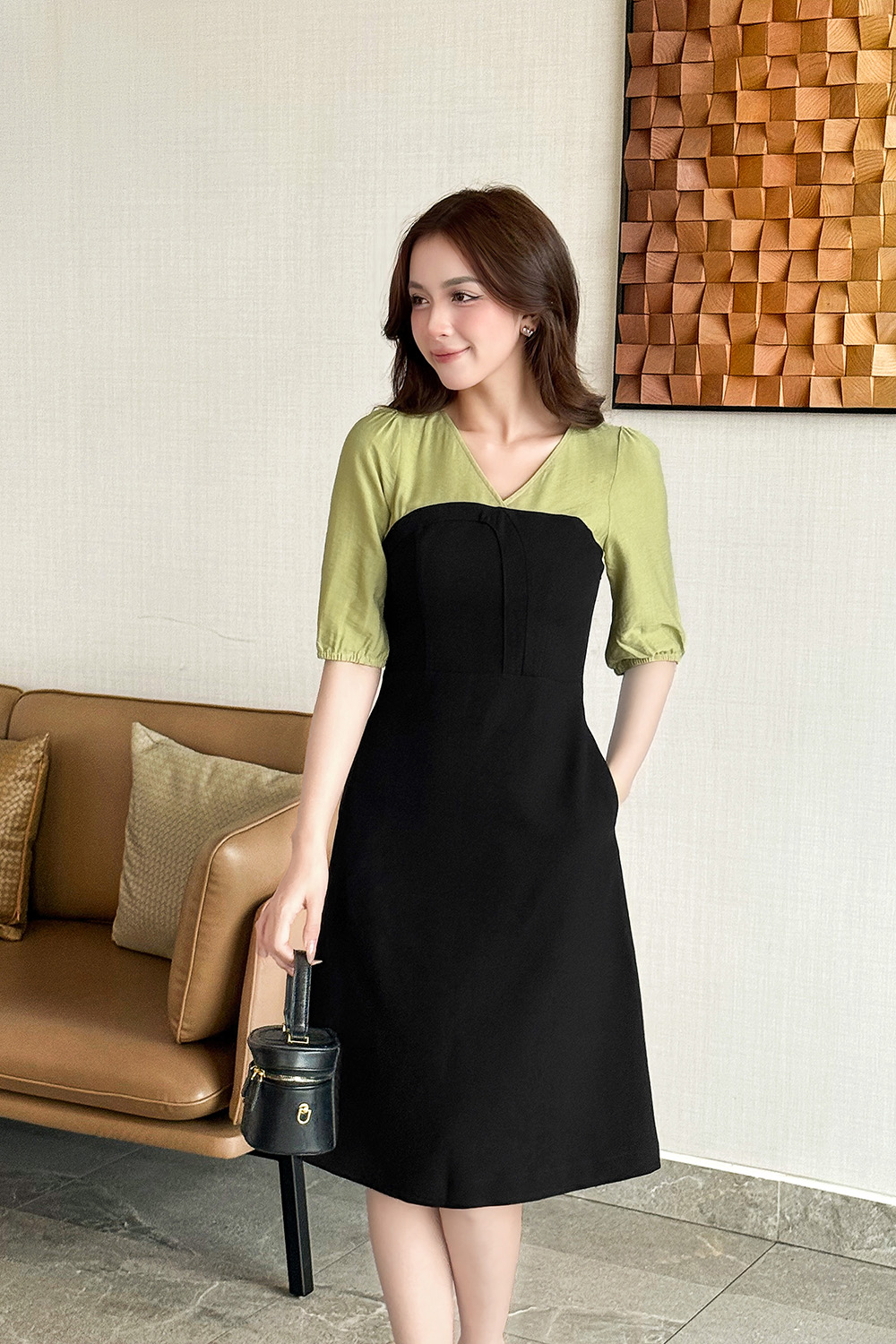 Đầm đen thun tuyết dáng chữ A tay phối màu