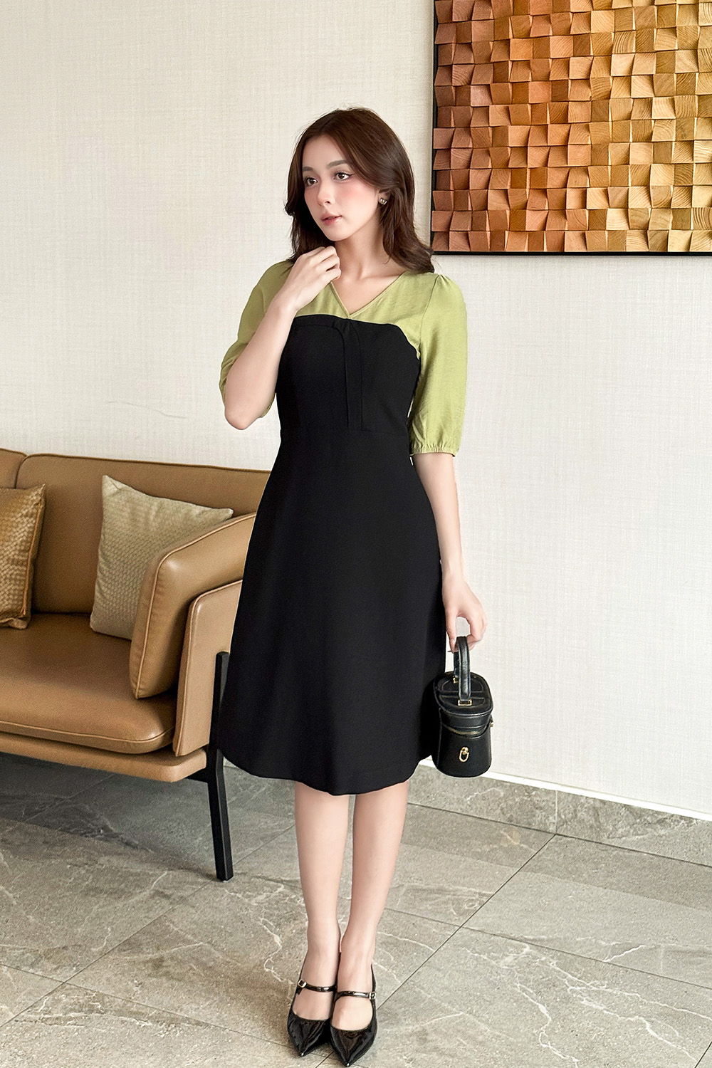 Đầm đen thun tuyết dáng chữ A tay phối màu