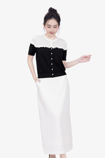 Áo len dệt kim cổ tròn màu đen phối trắng