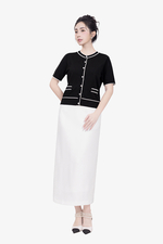 Áo len dệt kim màu đen cổ tròn phối viền trắng