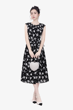 Đầm đen hoa dáng chữ A tùng đắp chéo