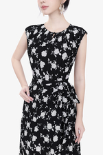 Đầm đen hoa dáng chữ A tùng đắp chéo